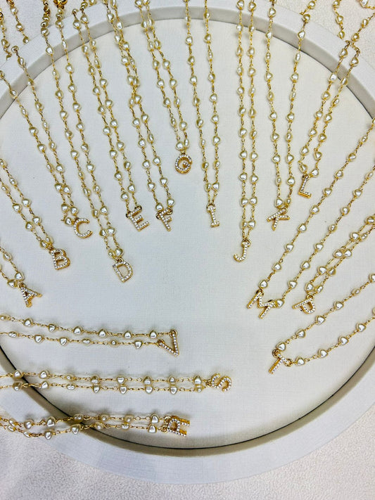 Initial necklace with synthetic pearls