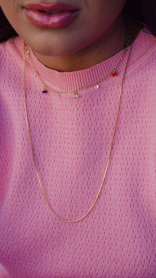 Chocker colored hanging pebbles