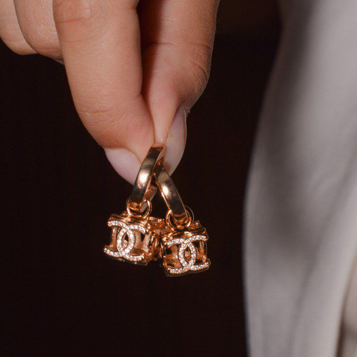 Hoop Earrings with Crystal-Paved Dice Charm – Bold and Stylish