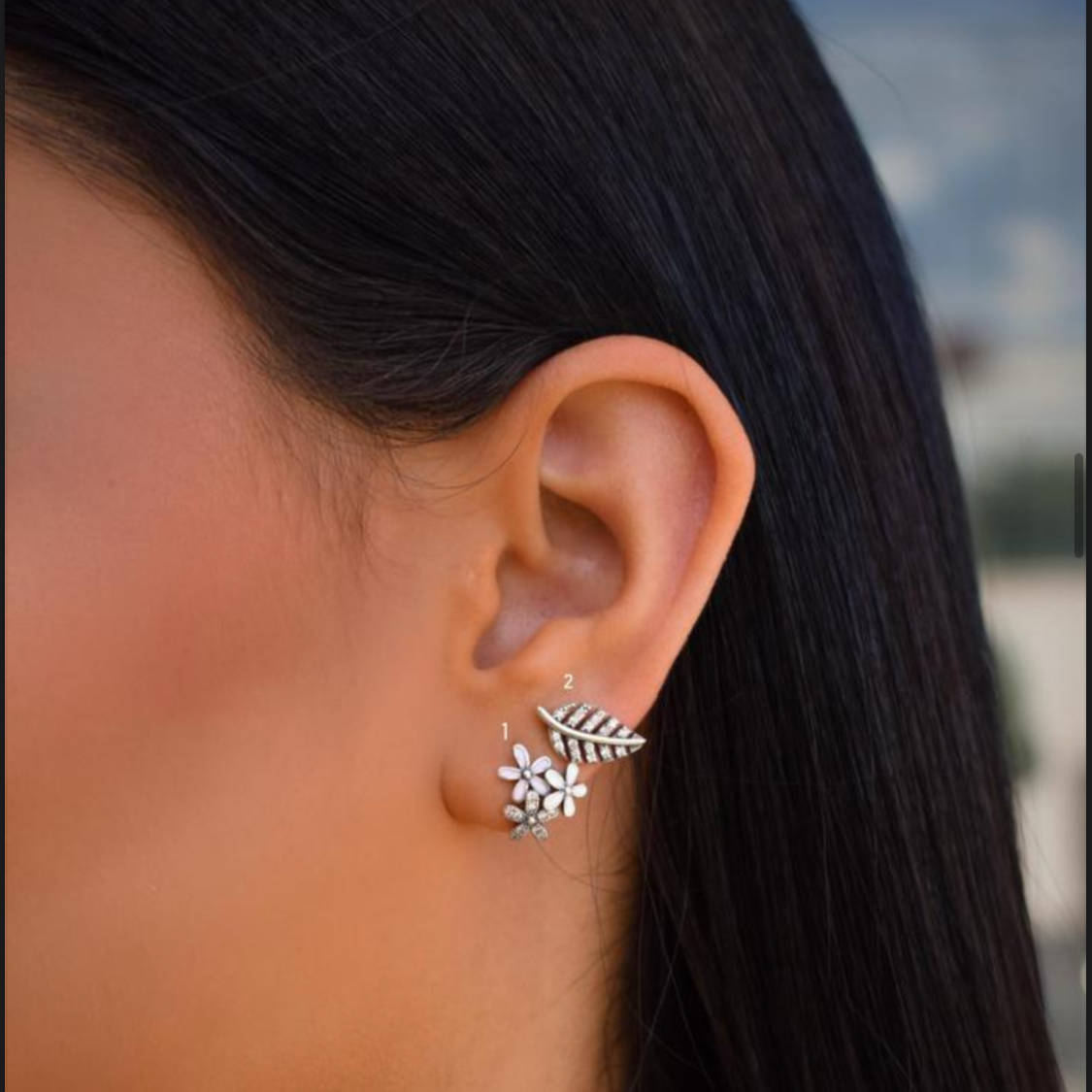 Three silver flower earring
