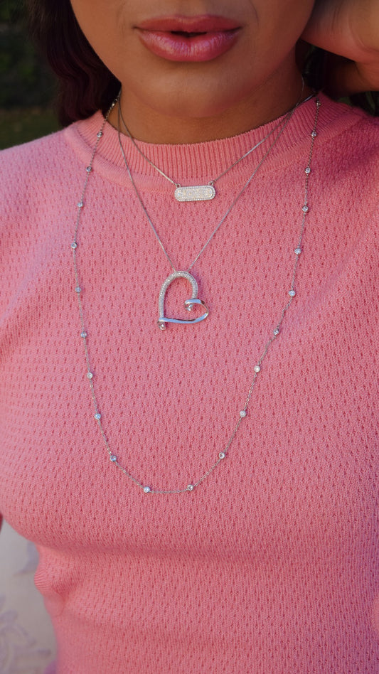 Large heart necklace studded with white gold