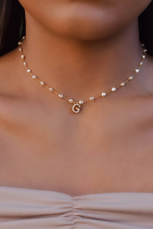 Initial necklace with synthetic pearls